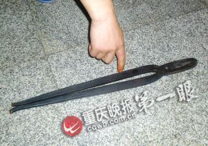 厨师为吸毒设计长柄大剪刀剪卷帘门盗窃(图)